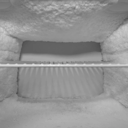 Two empty freezer drawers