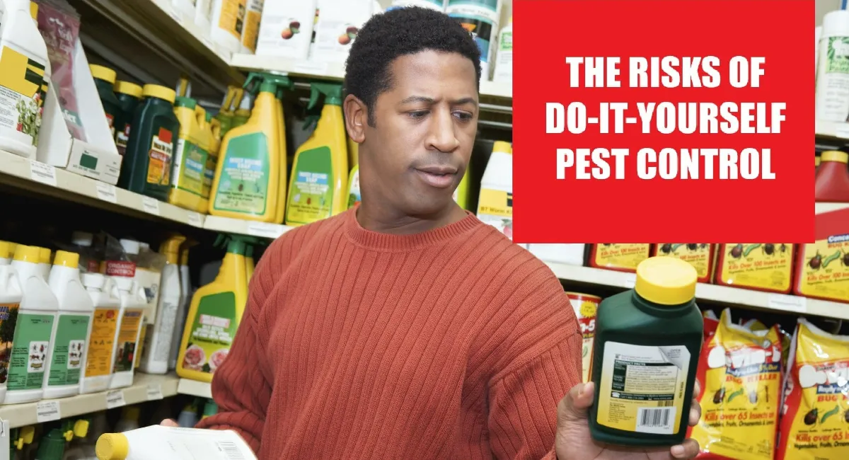 Man holding a bottle of a pest repellent