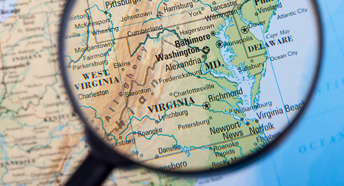Magnifying glass on map showing east coast states