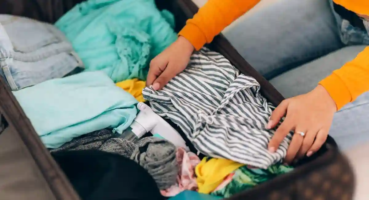 Woman unpacking clothes