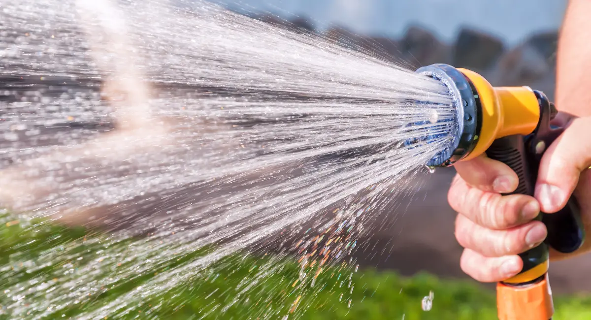 Man holding hose