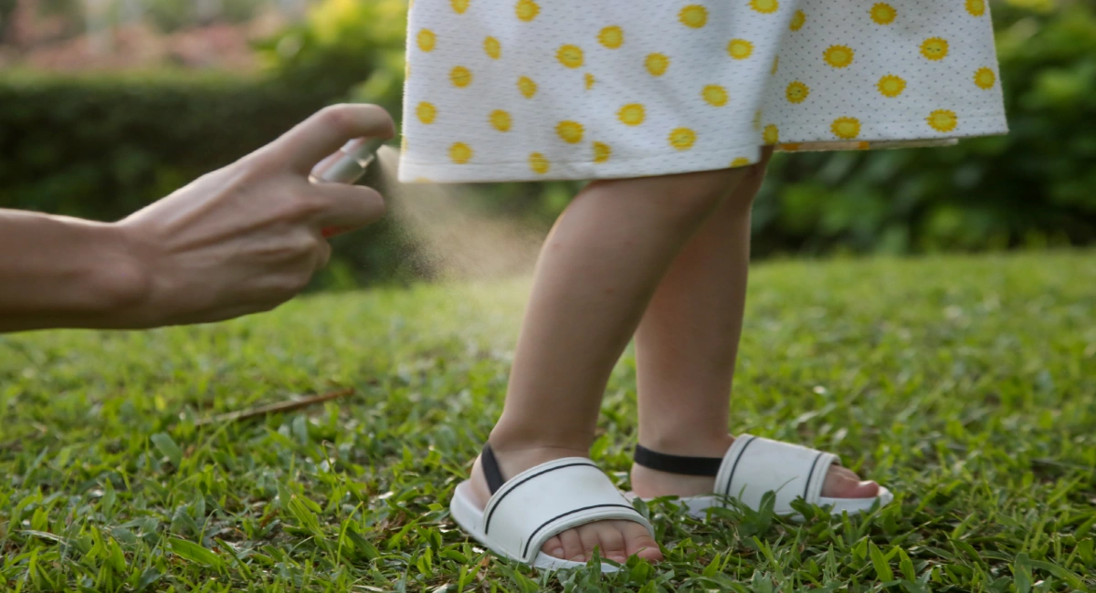bug spray on child